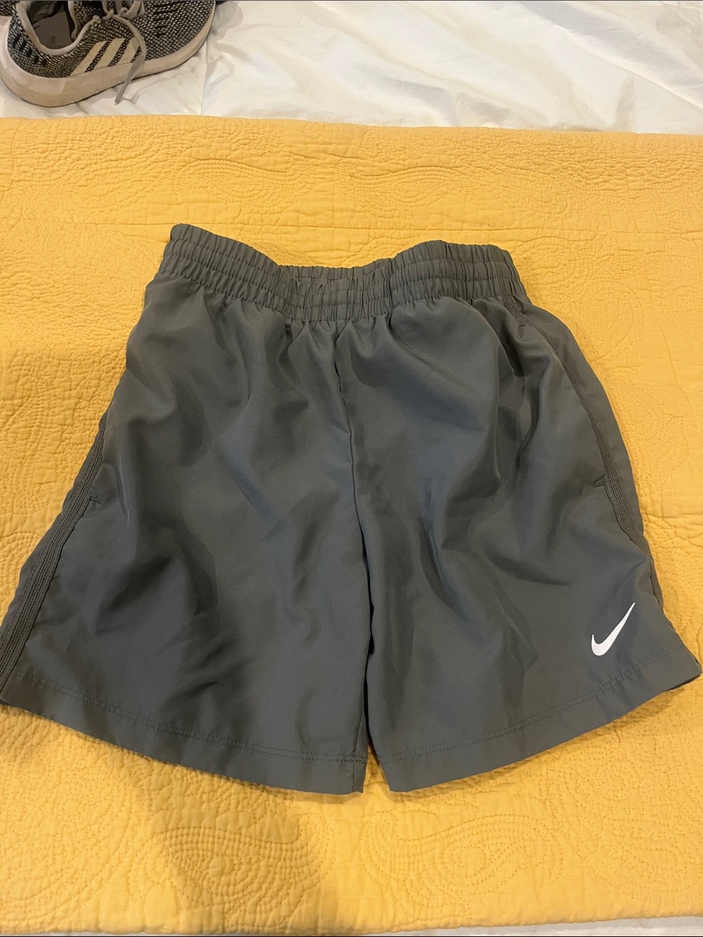 Nike Kids Gray Athletic Shorts with White Swoosh